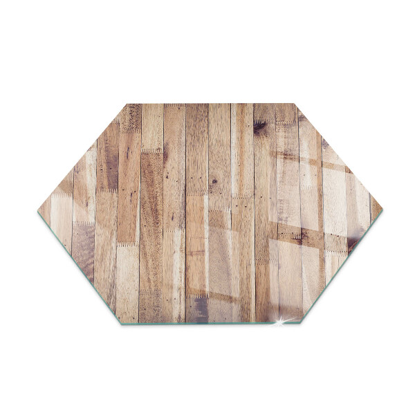 Hexagonal glass hearth for stove Wooden board in the layout