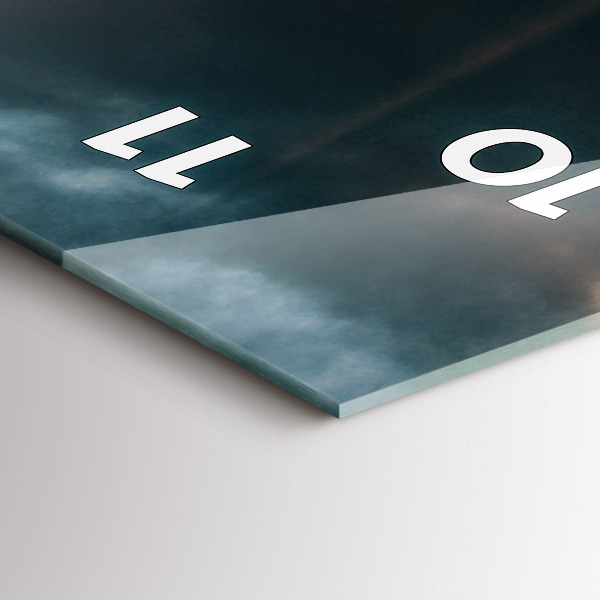 Vertical wall clock The Eiffel Tower against the clouds