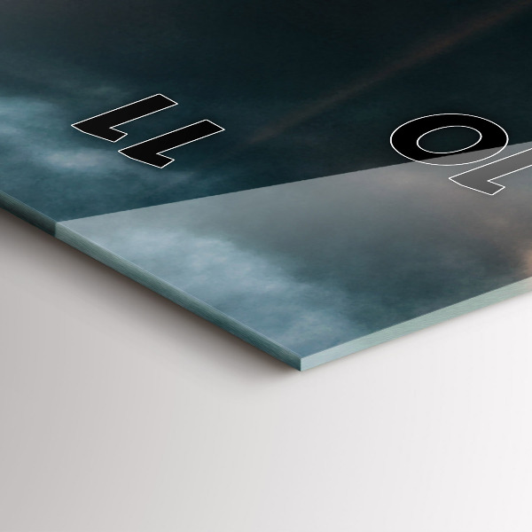 Vertical wall clock The Eiffel Tower against the clouds