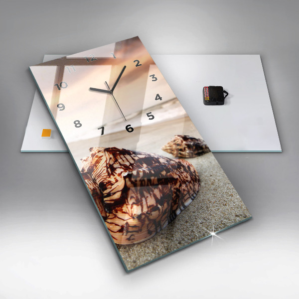 Vertical wall clock A shell on the beach
