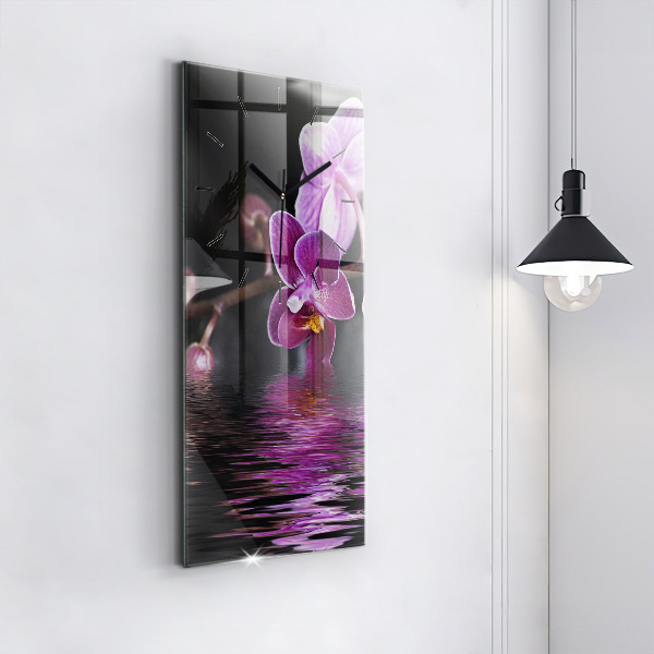Vertical wall clock Orchid flower on the water