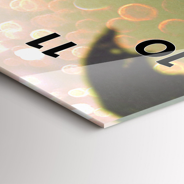 Vertical wall clock People with umbrellas