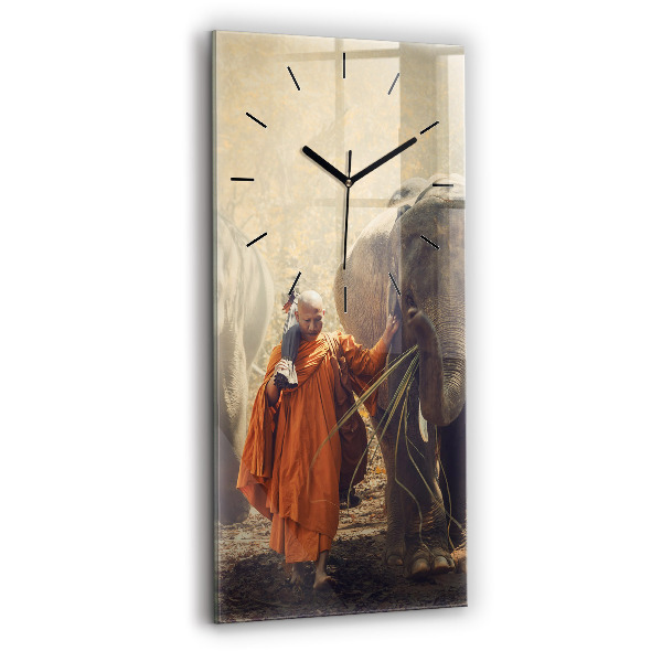 Vertical wall clock Monk leading elephants