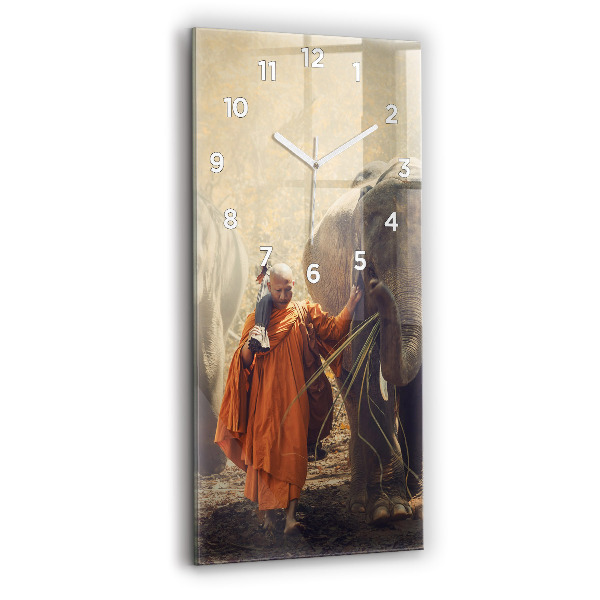 Vertical wall clock Monk leading elephants