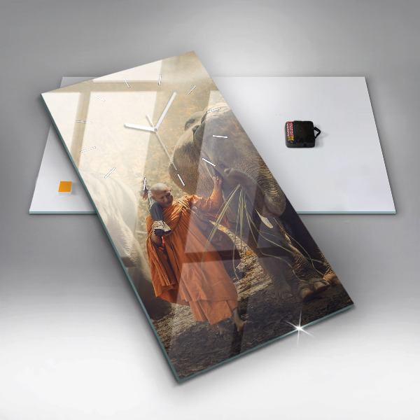 Vertical wall clock Monk leading elephants