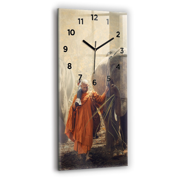 Vertical wall clock Monk leading elephants