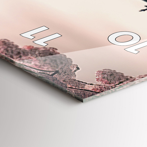 Vertical wall clock Tower and flowers in Asia