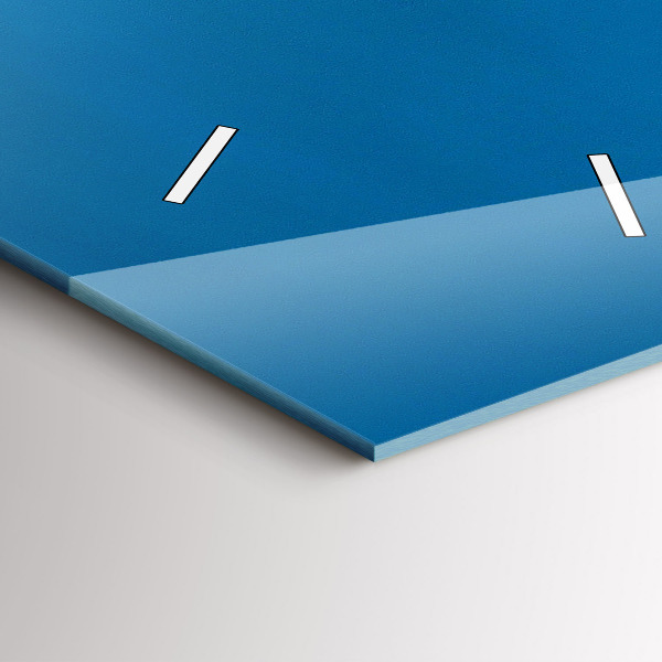 Vertical wall clock Tower Bridge London at night