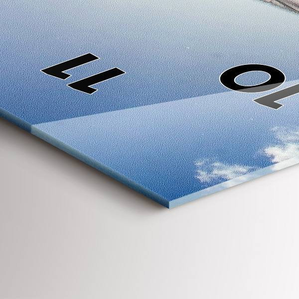 Vertical wall clock The Polish flag against the sky