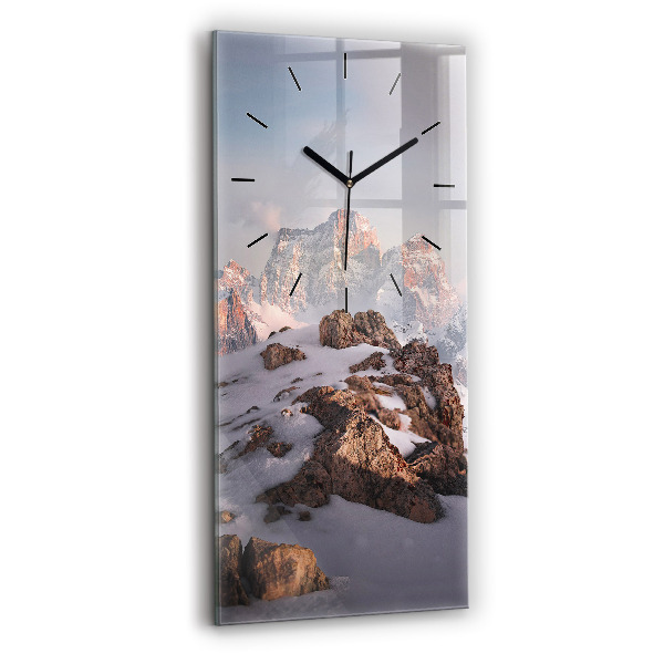 Vertical wall clock A mountain covered in snow