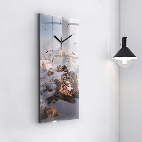 Vertical wall clock A mountain covered in snow