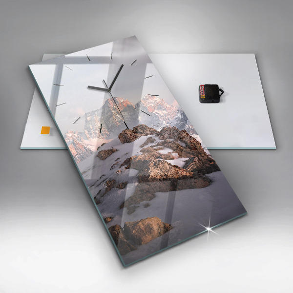 Vertical wall clock A mountain covered in snow