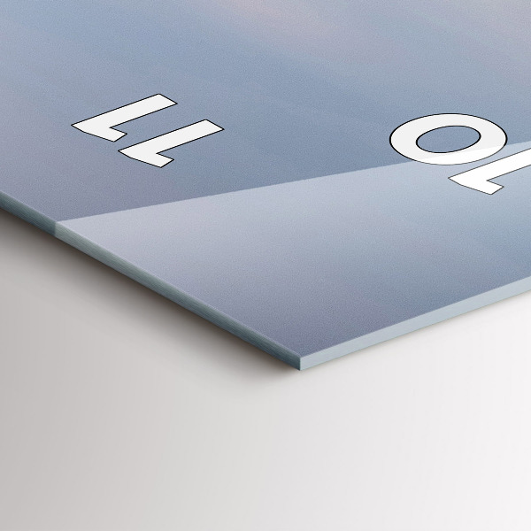 Vertical wall clock A mountain covered in snow