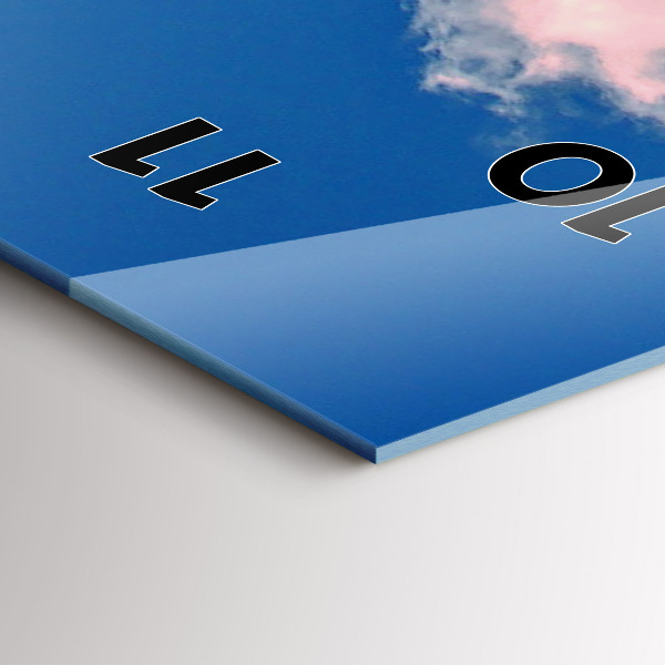 Vertical wall clock Mountains under blue sky