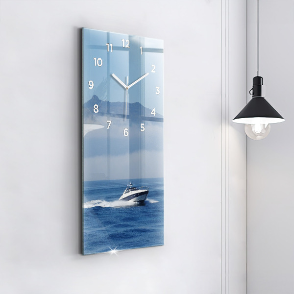 Vertical wall clock A boat floating on the ocean