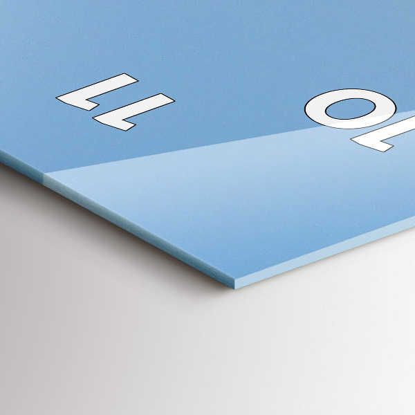 Vertical wall clock A boat floating on the ocean