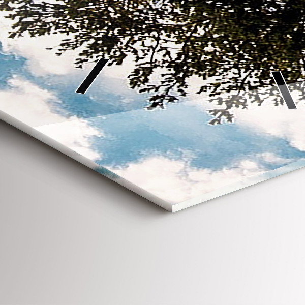 Vertical wall clock A tree on a hill