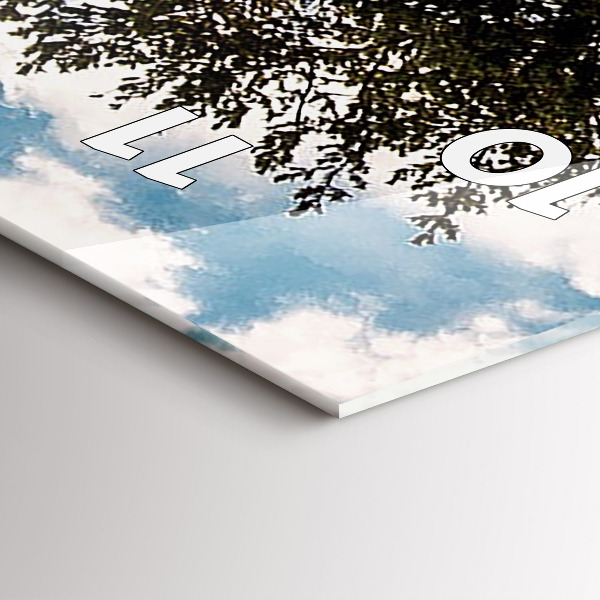 Vertical wall clock A tree on a hill