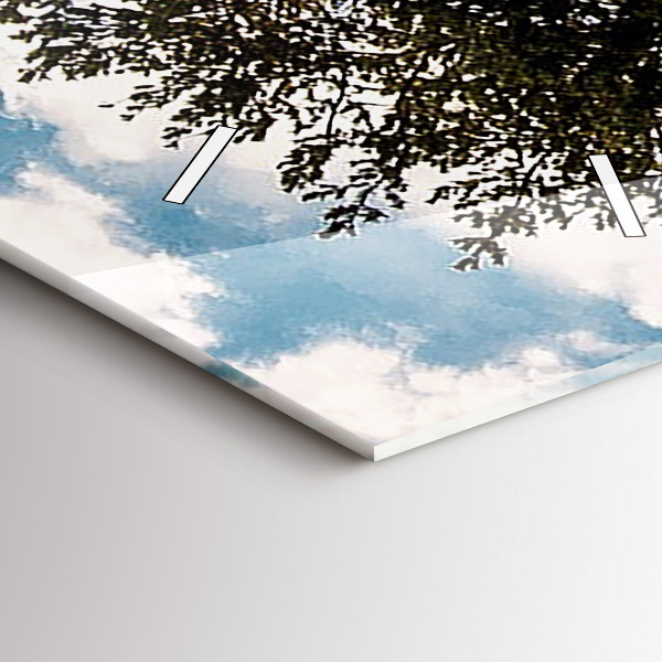 Vertical wall clock A tree on a hill