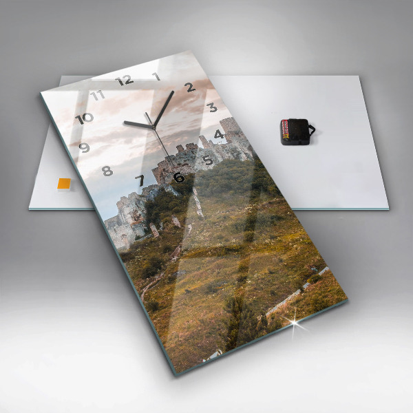 Vertical wall clock Spiš Castle in Slovakia