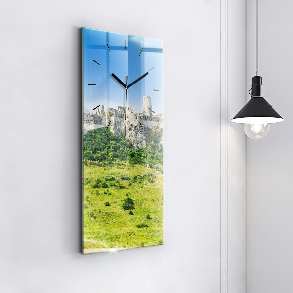 Vertical wall clock Spiš Castle in Slovakia