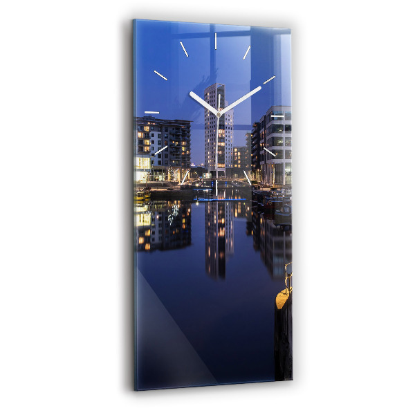Vertical wall clock The city lit up at night