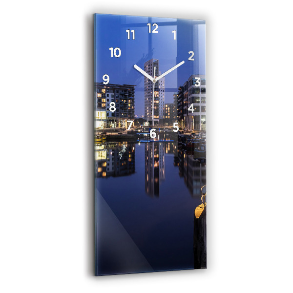 Vertical wall clock The city lit up at night