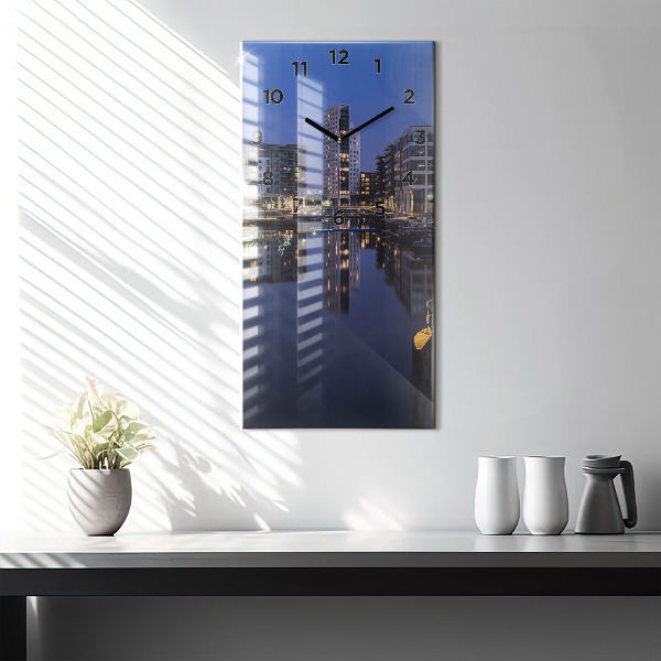 Vertical wall clock The city lit up at night