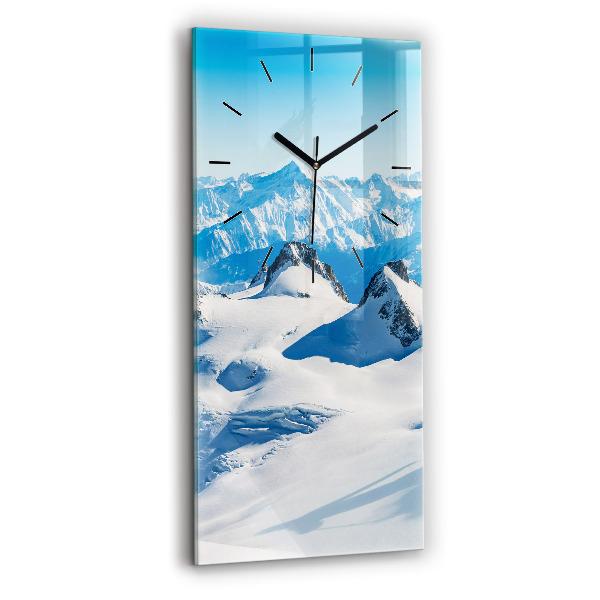 Vertical wall clock Skier in the Alps