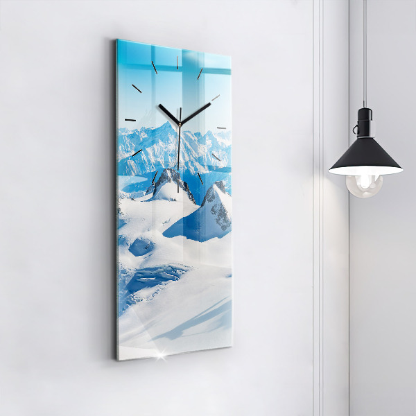 Vertical wall clock Skier in the Alps