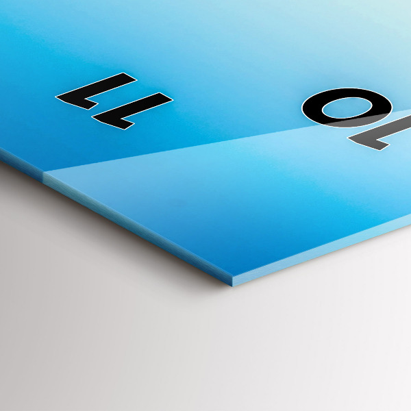 Vertical wall clock Skier in the Alps