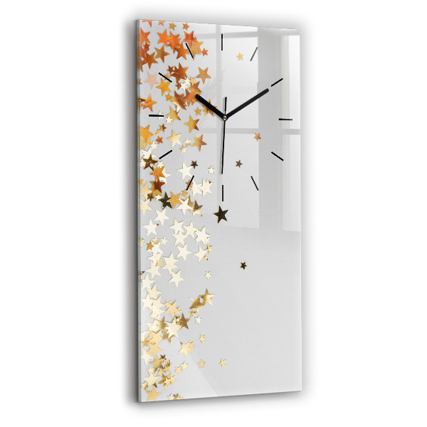 Vertical wall clock Stars on a light background