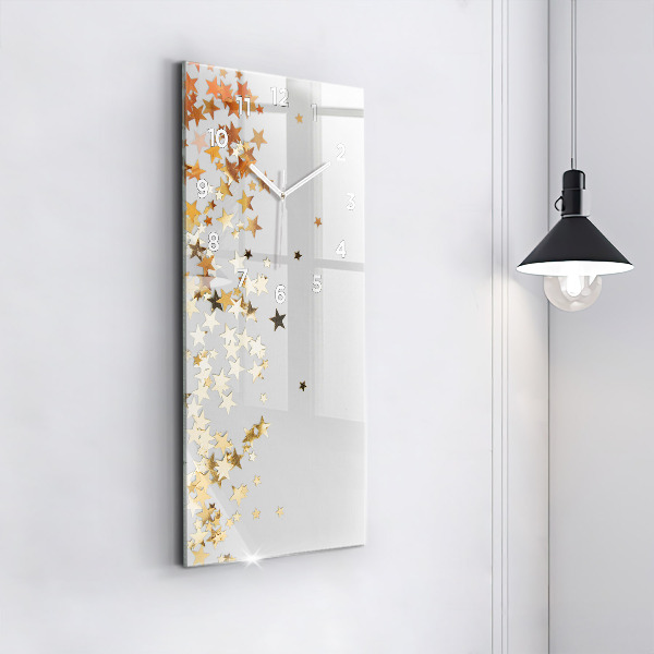 Vertical wall clock Stars on a light background