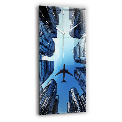 Vertical wall clock Airplane over buildings
