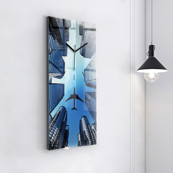 Vertical wall clock Airplane over buildings