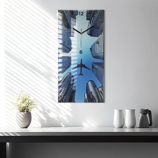 Vertical wall clock Airplane over buildings