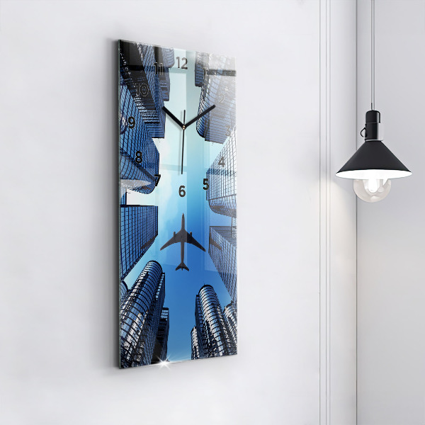 Vertical wall clock Airplane over buildings