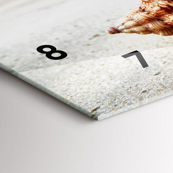 Horizontal wall clock A shell on the beach