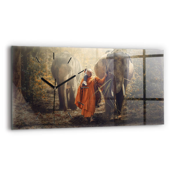 Horizontal wall clock Monk leading elephants