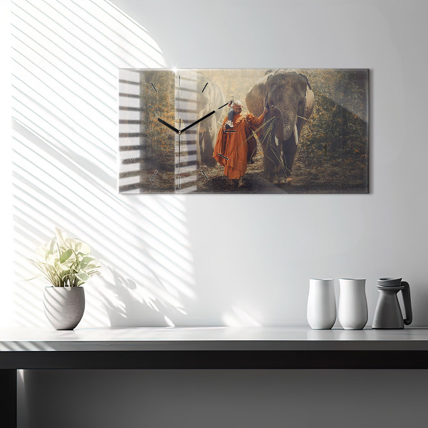Horizontal wall clock Monk leading elephants