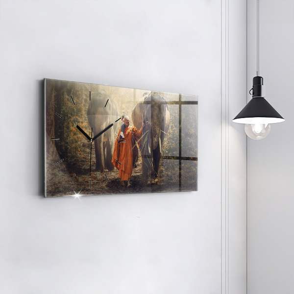 Horizontal wall clock Monk leading elephants