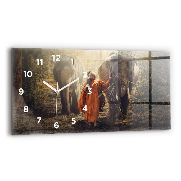 Horizontal wall clock Monk leading elephants