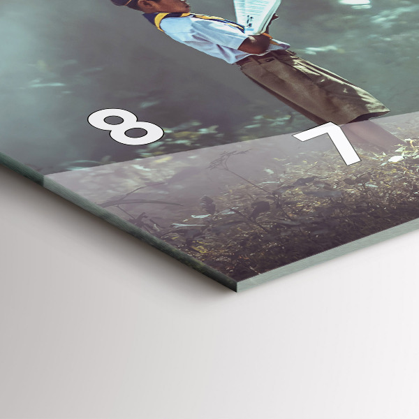 Horizontal wall clock A boy is reading a book