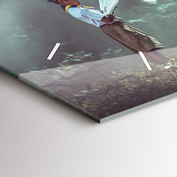 Horizontal wall clock A boy is reading a book