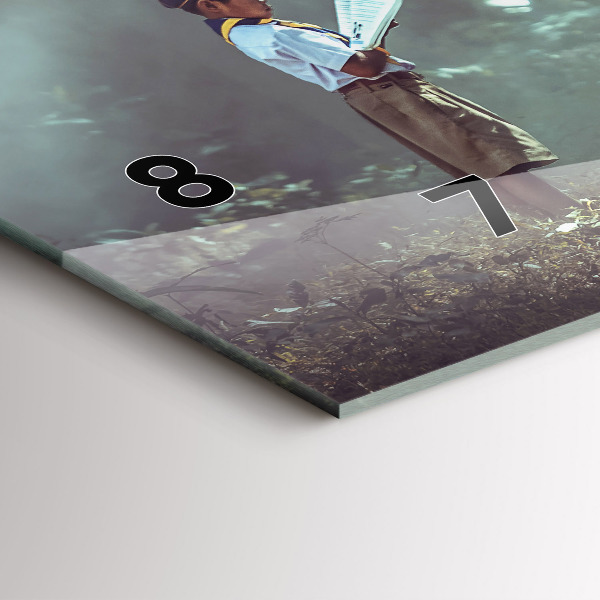 Horizontal wall clock A boy is reading a book