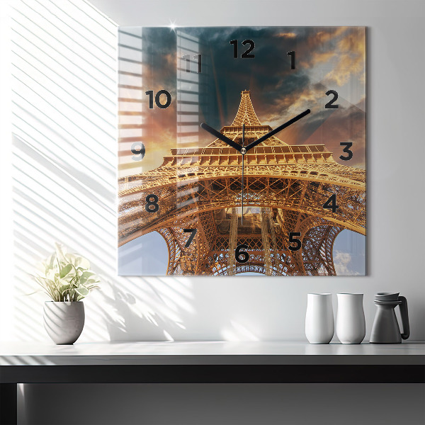 Square wall clock The Eiffel Tower against the clouds