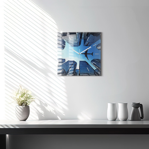 Square wall clock Airplane over buildings