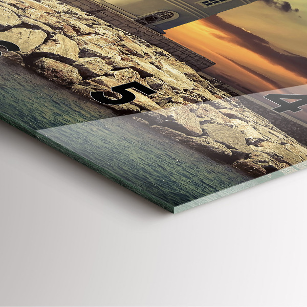 Square wall clock Lighthouse on the water