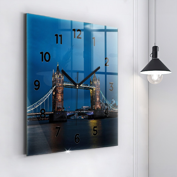 Square wall clock Tower Bridge London at night