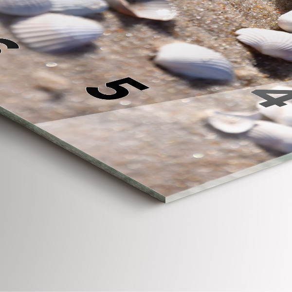 Square wall clock Seashells on the beach
